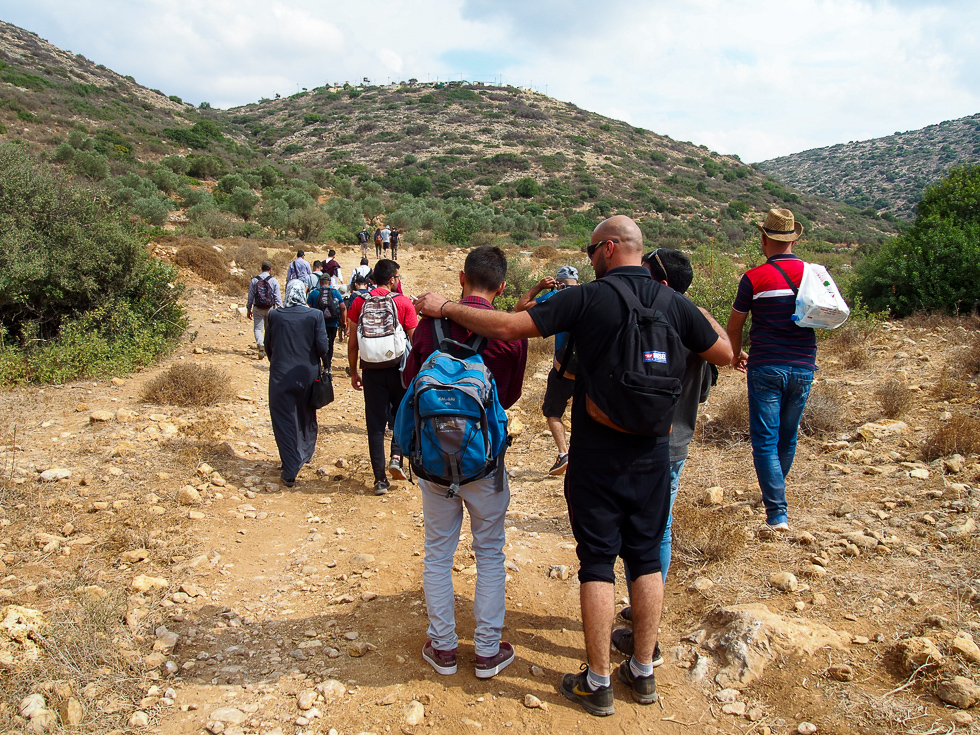 Palestinian hikers on the trail in Wadi Qana, West Bank, Palestine