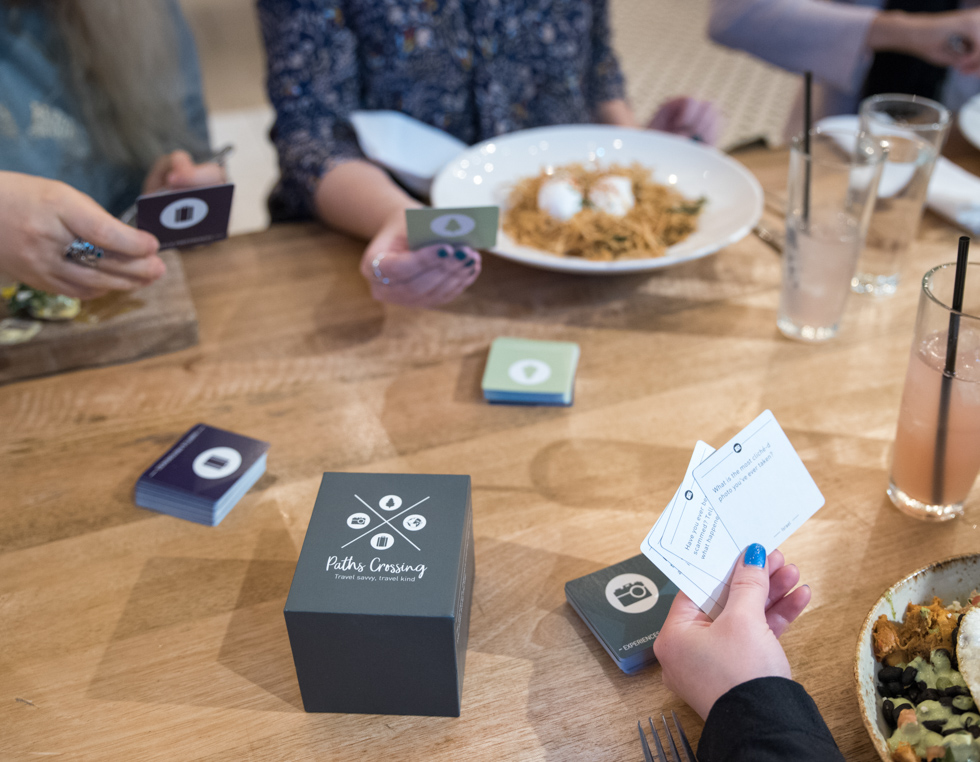 Paths Crossing game play at a restaurant